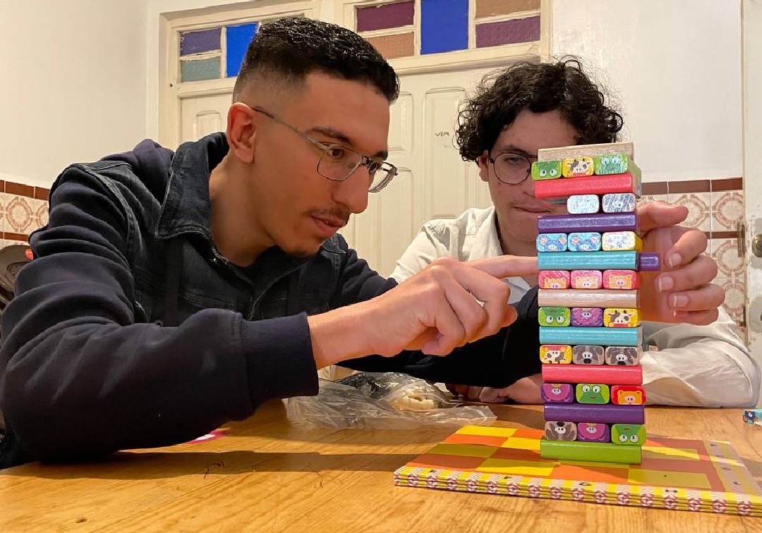 Two young people playing a game at House of Games