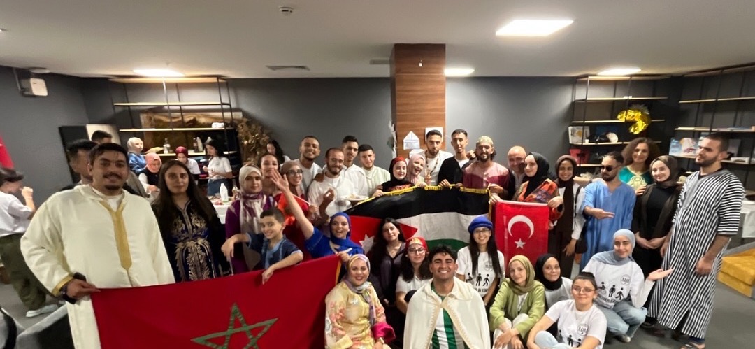 Participants of Together in Konya with the flags of their countries