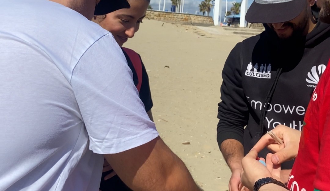 Volunteers on the beach during a clean-up
